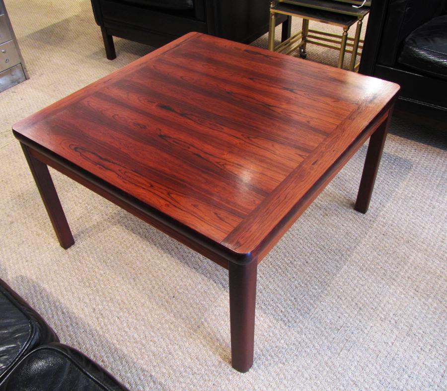 A rosewood coffee table