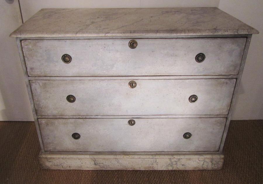 A painted three drawer commode