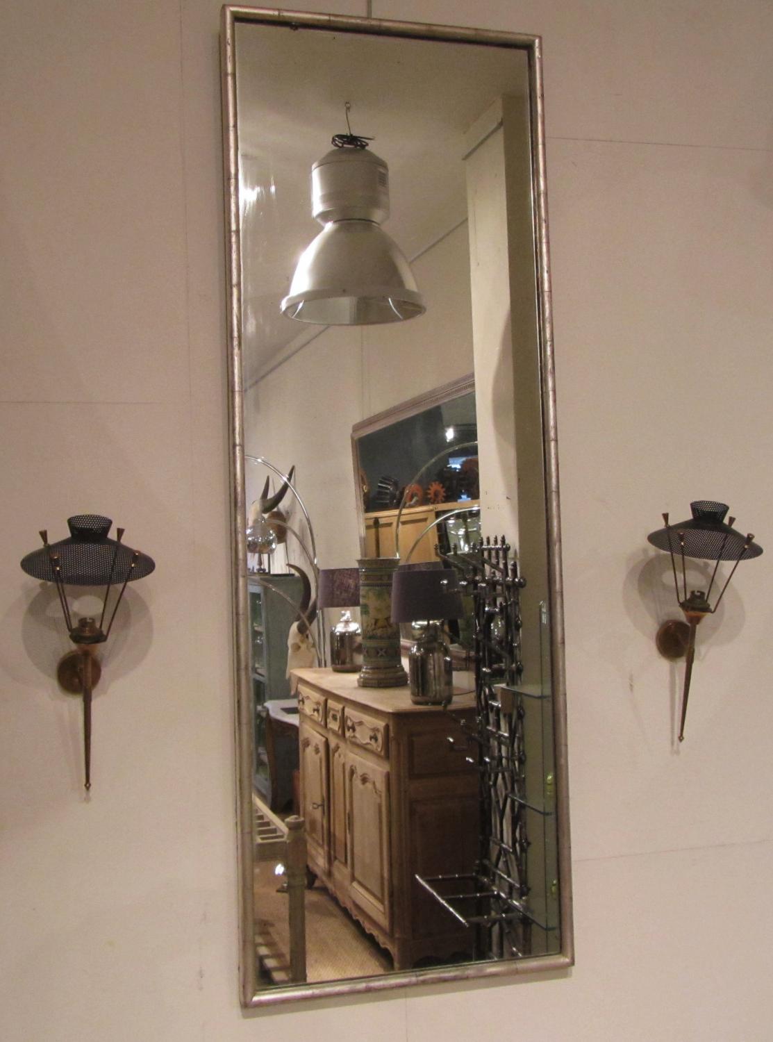 A silver gilt shop mirror