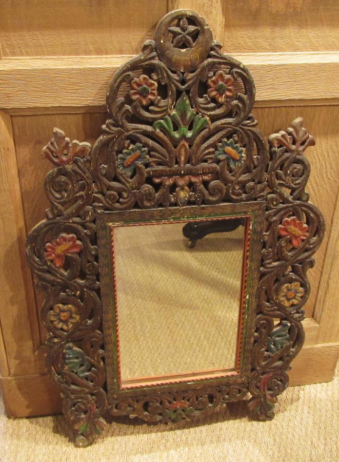 A small 19thC painted wood mirror