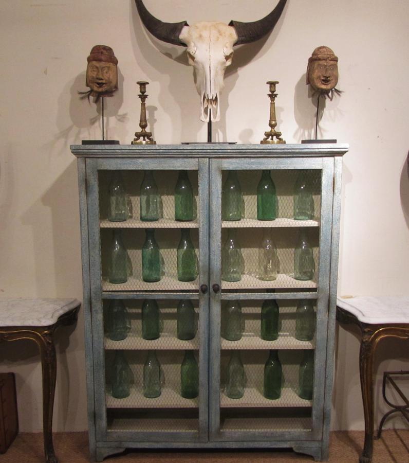 A painted larder cabinet