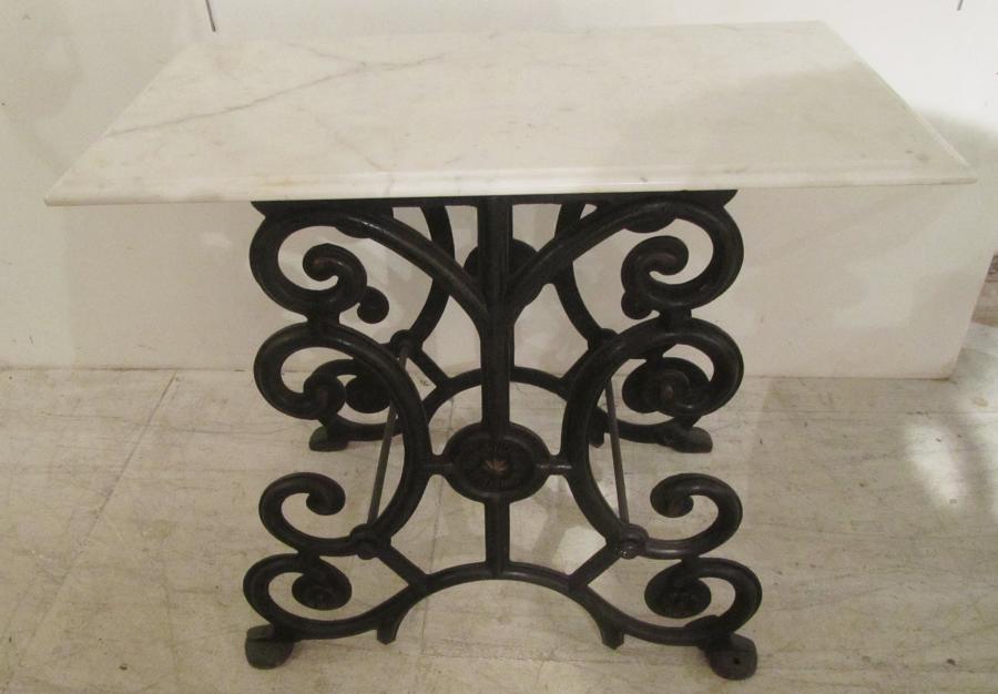 A 19thC iron and marble table