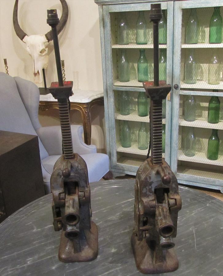 A pair of bottle jack lamps