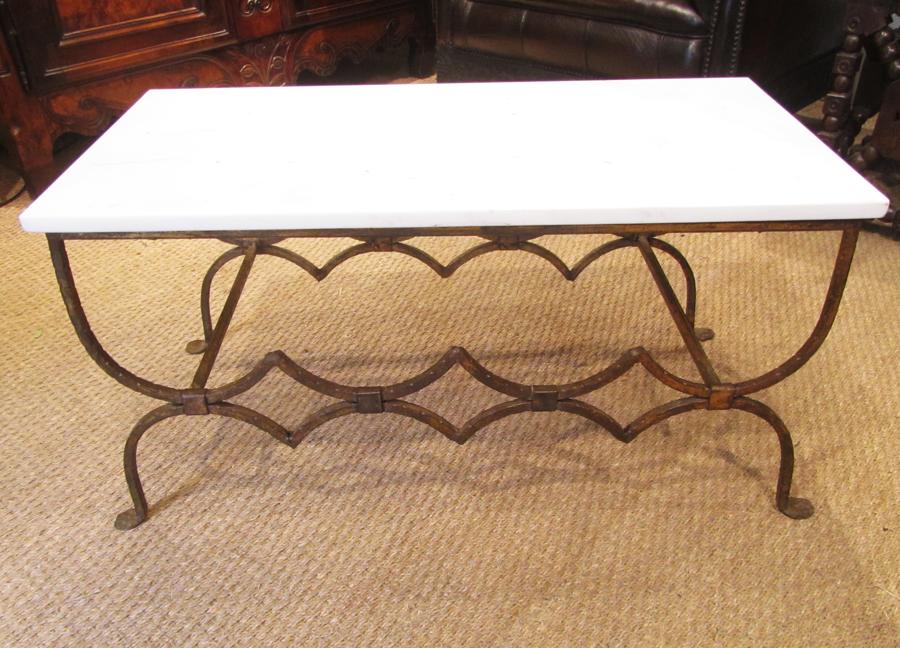 A gilt iron coffee table