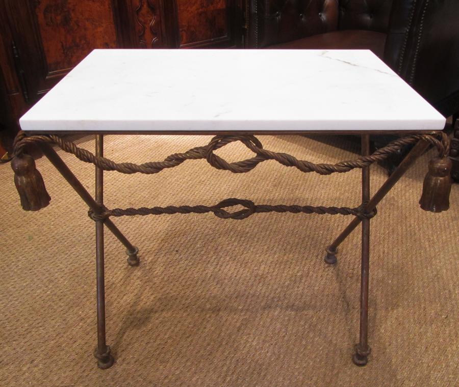 A gilt metal and marble side table