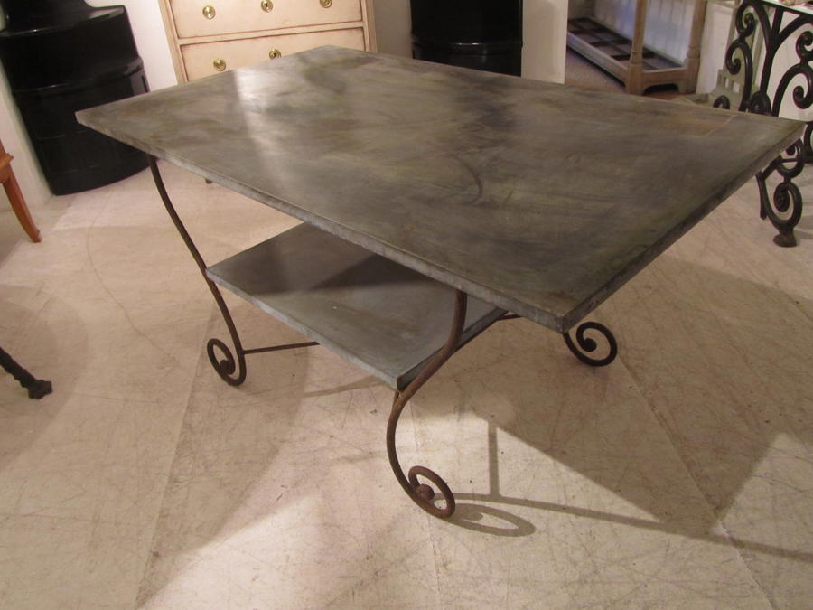 A Zinc and iron potting table