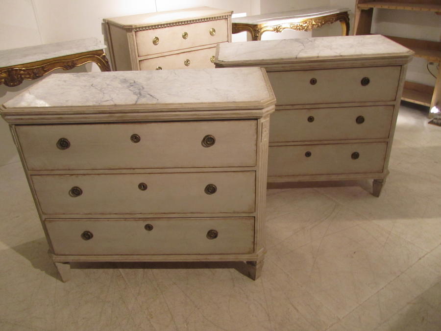 A large pair of Swedish painted commodes