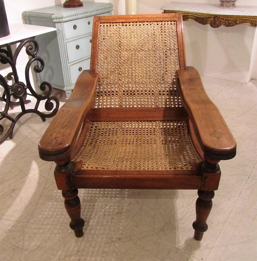 A caned plantation chair