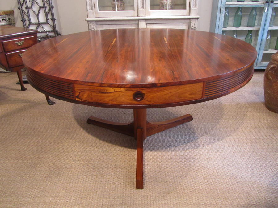 A rosewood drum dining table
