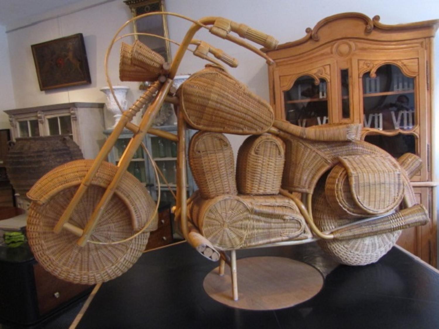 A wicker work sculpture of a vintage Harley D