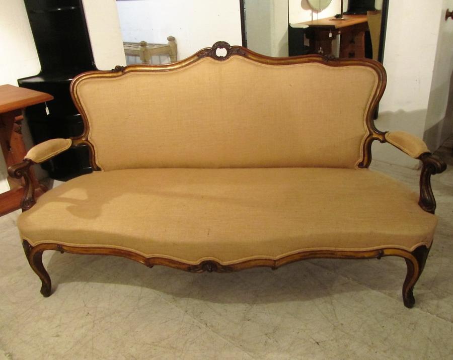A walnut and parcel gilt settee