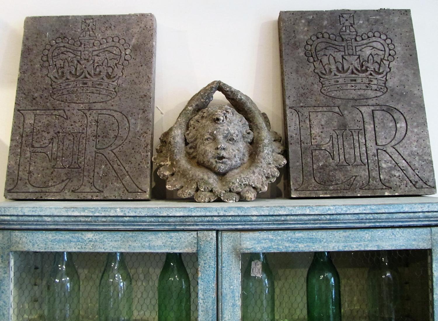 A pair of royal Portland stone panels
