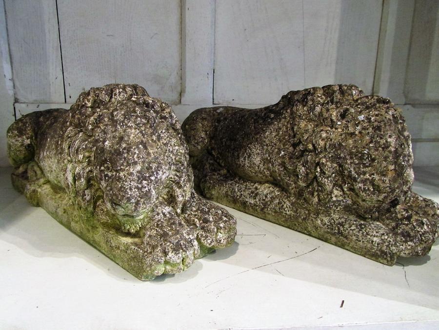 A pair of composite stone lions