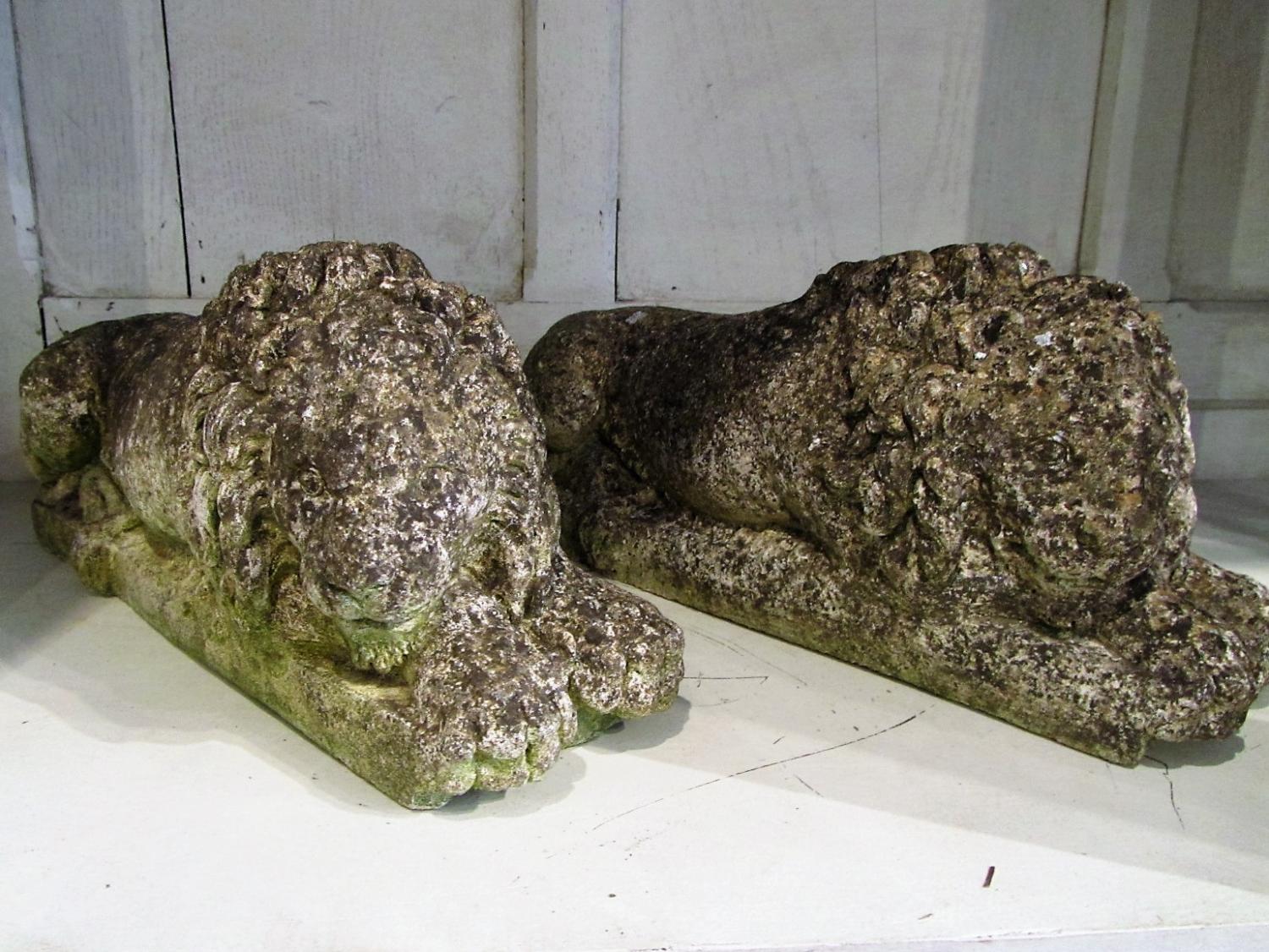 A pair of composite stone lions