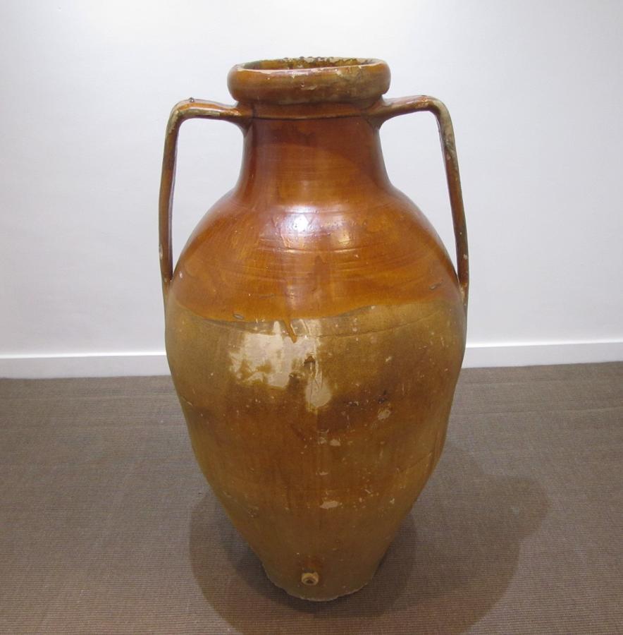 A huge terrracotta olive oil storage jar