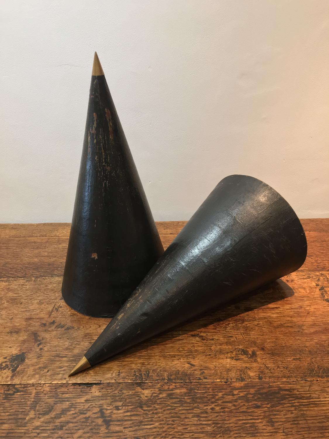 A pair of Conical architectural forms