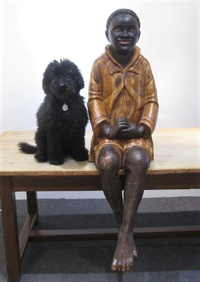 A carved wood Negro boy Advertising figure