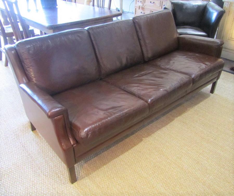 A three seater Danish leather sofa