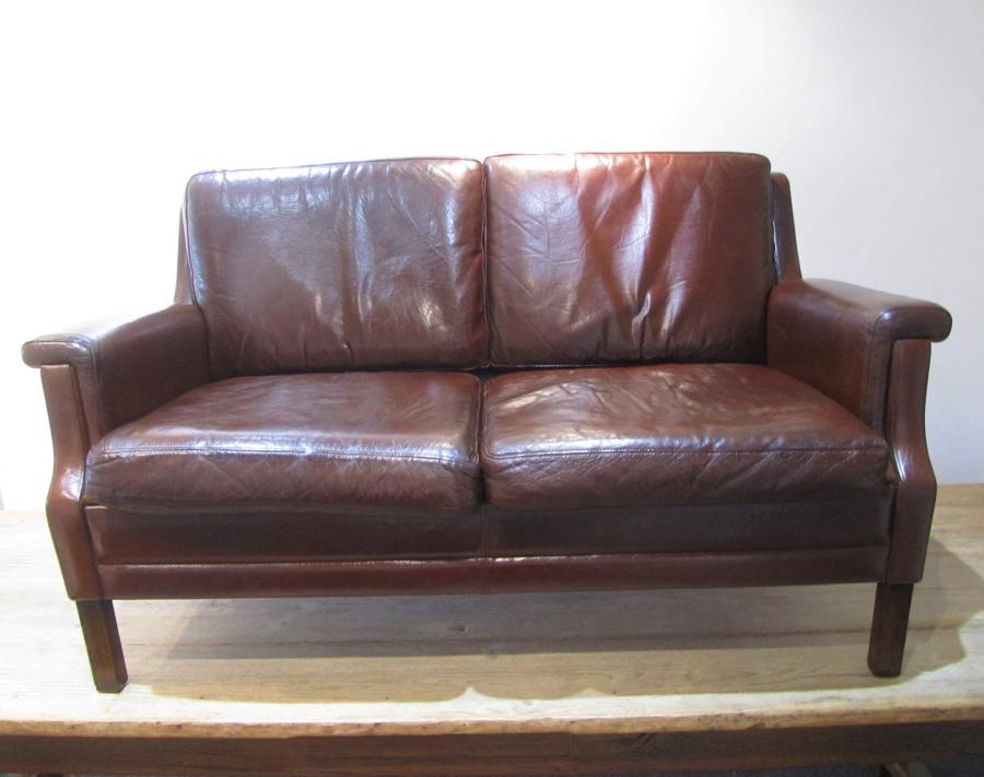 A Danish two seater leather sofa