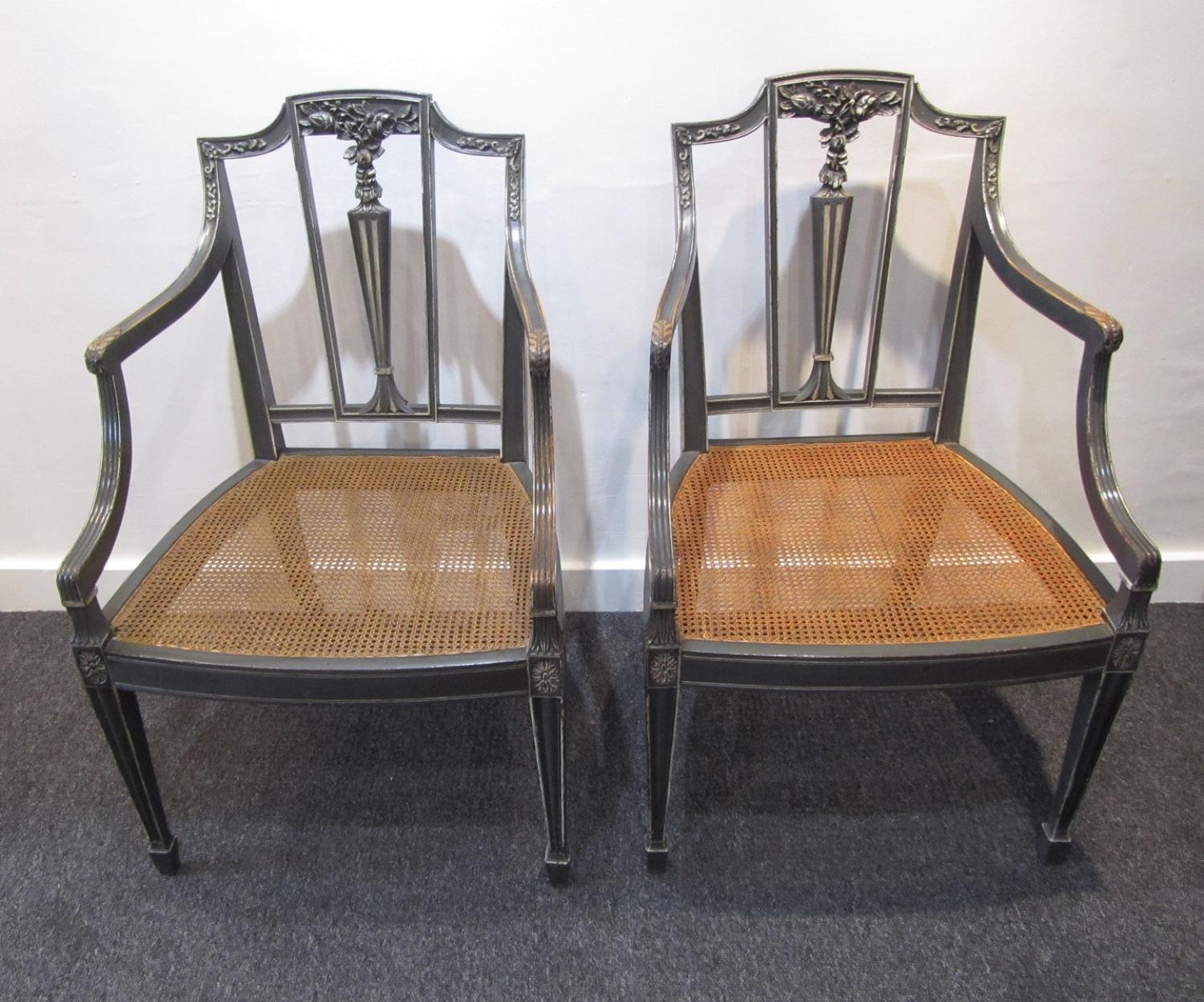 A pair of caned Sheraton style side chairs