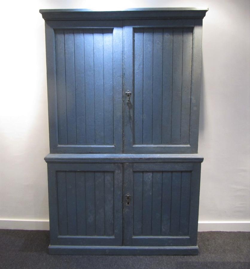 A painted two piece school cabinet
