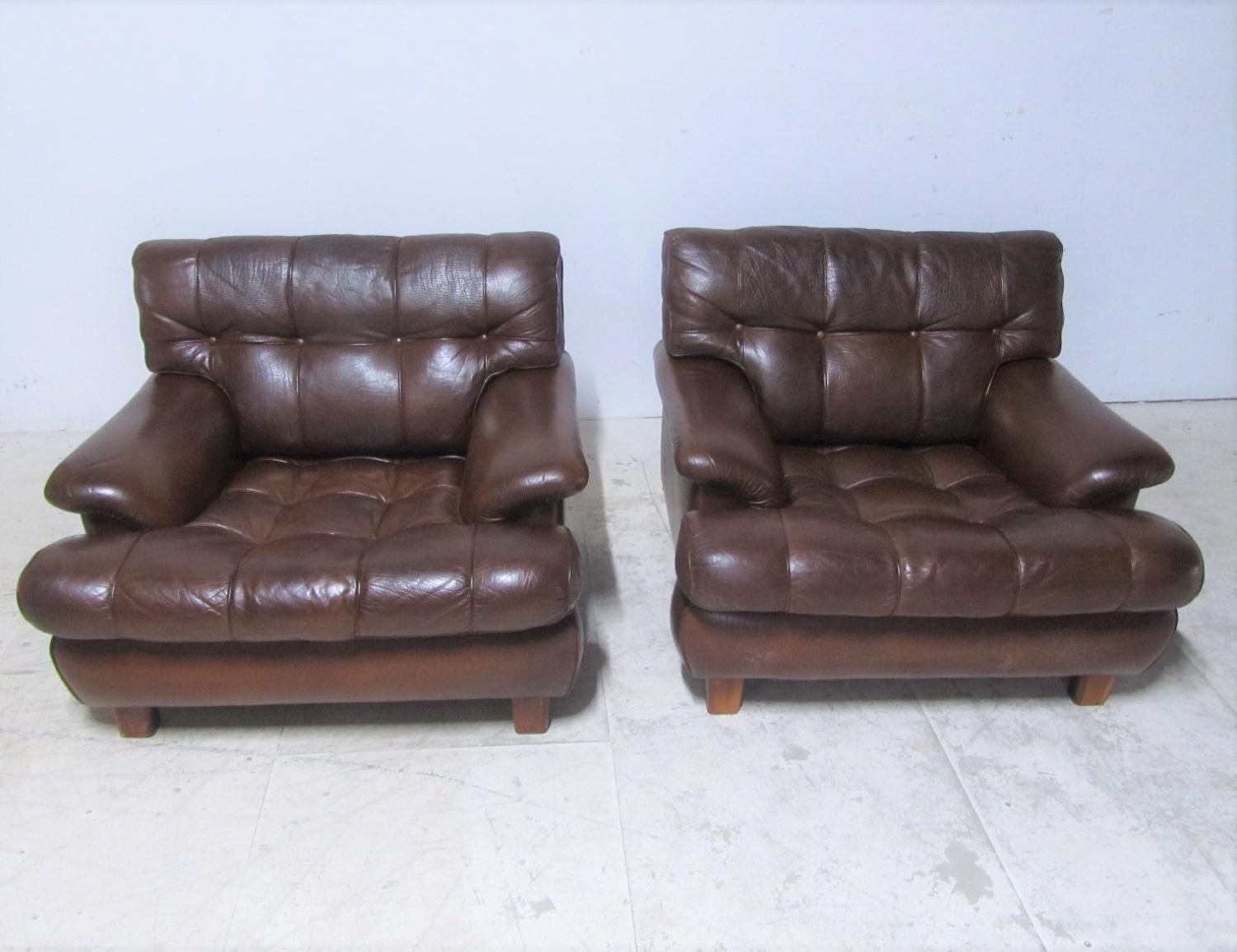 A pair of leather chairs by Arne Norrell