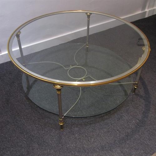 A circular Maison Jansen coffee table