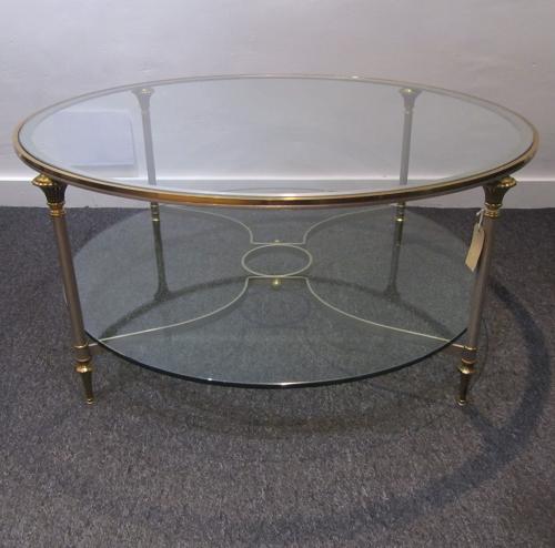A circular Maison Jansen coffee table