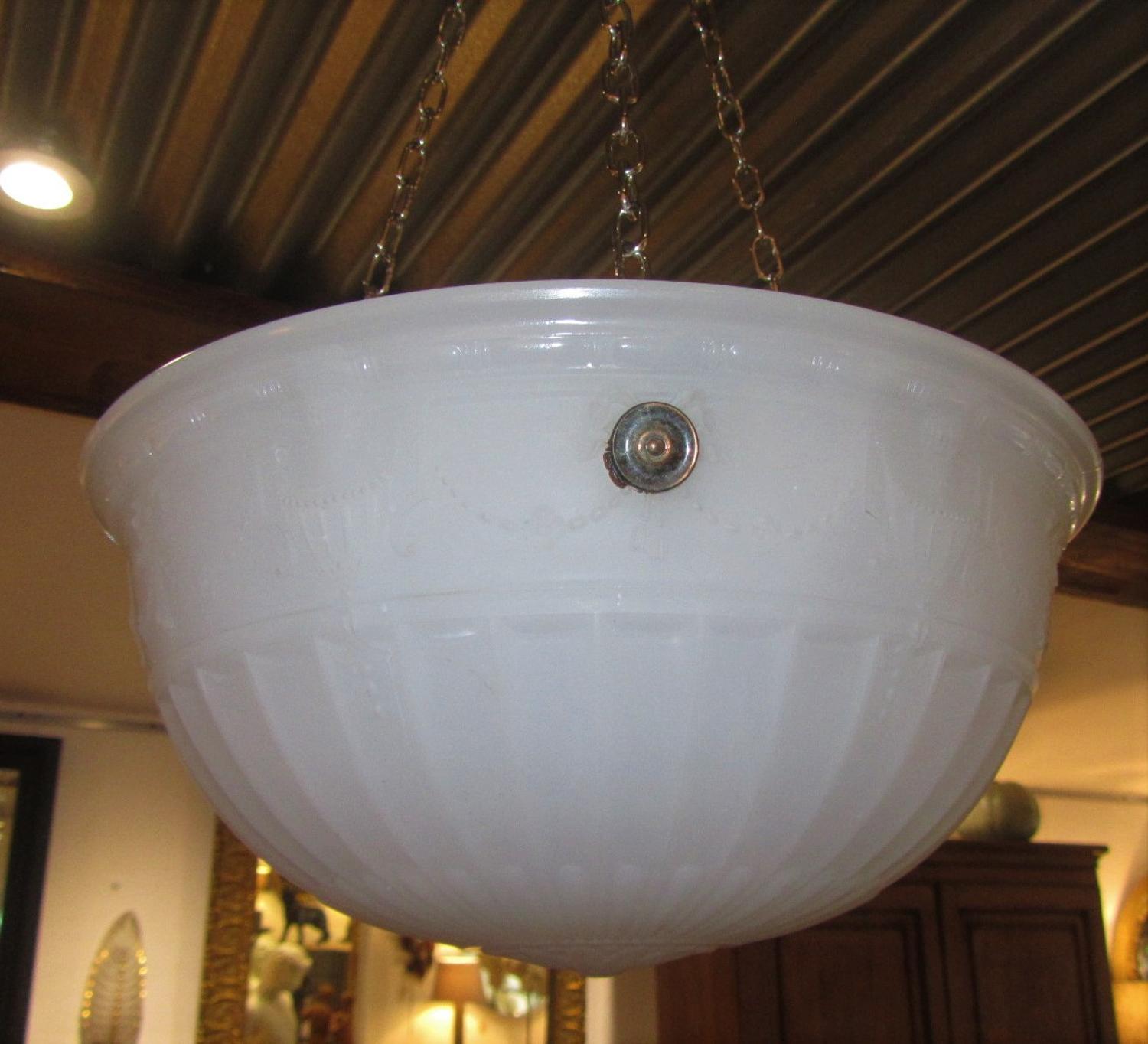 A milk glass plaffonier light