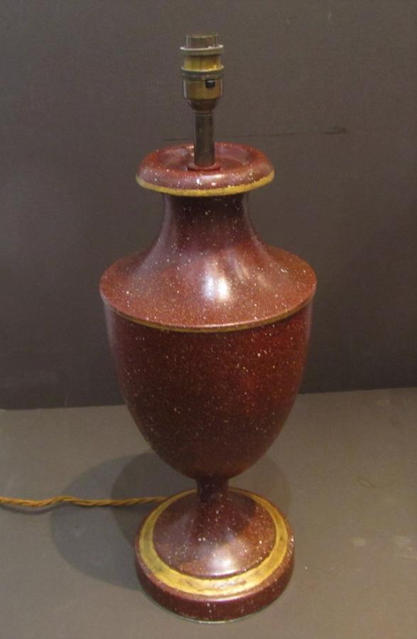A faux porphyry toleware table lamp