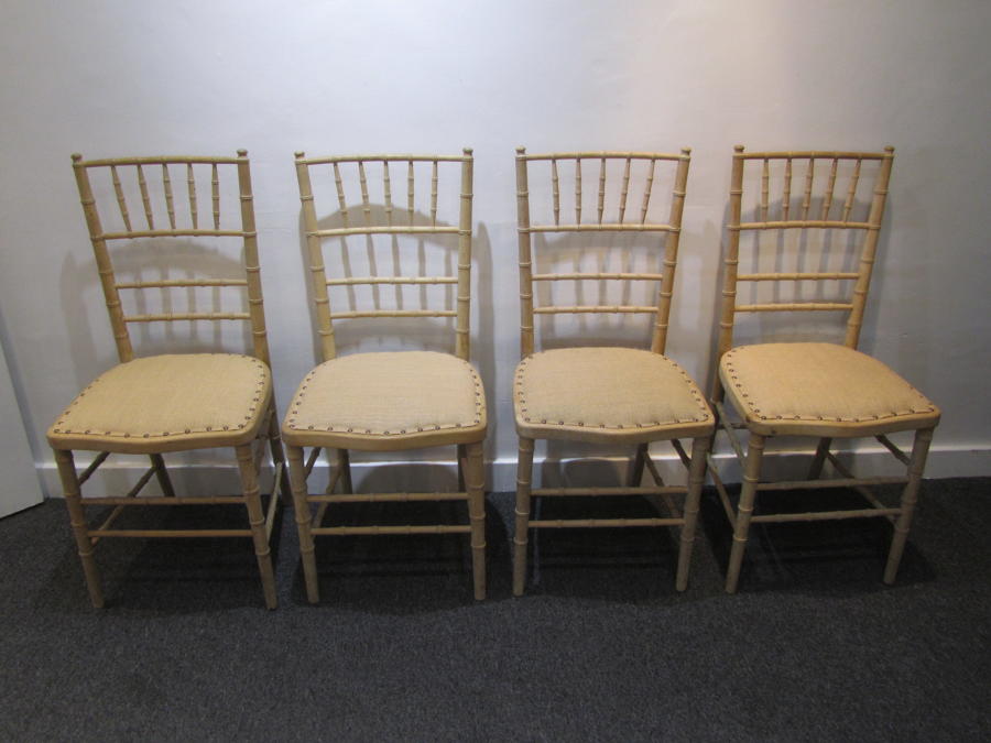 A set of 4 regency faux bamboo side chairs