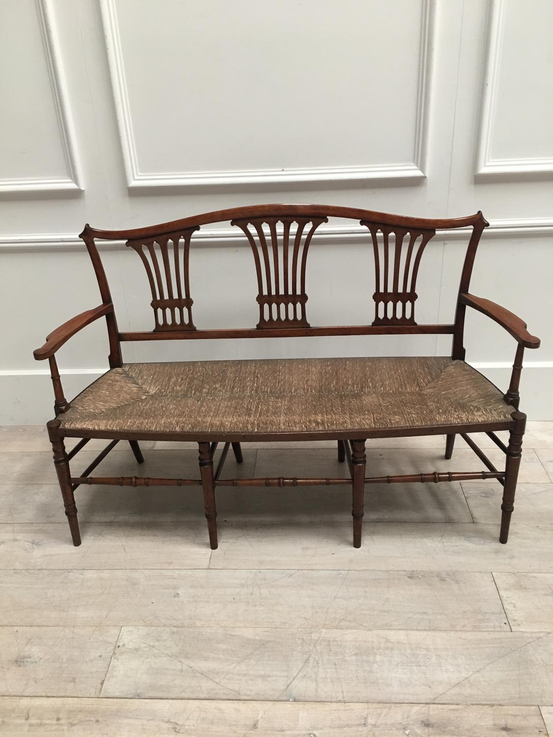 A 19thC Fruitwood settee bench