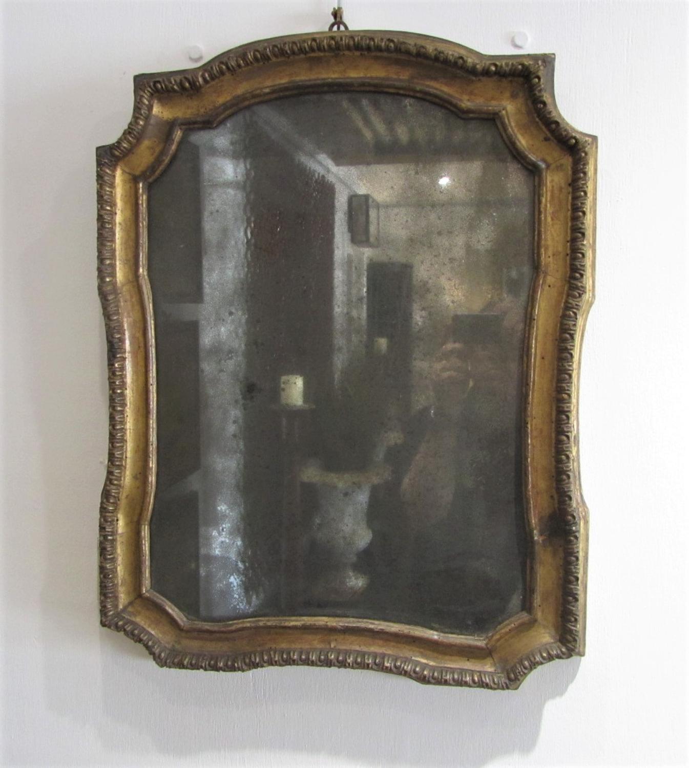 An 18thC giltwood mirror