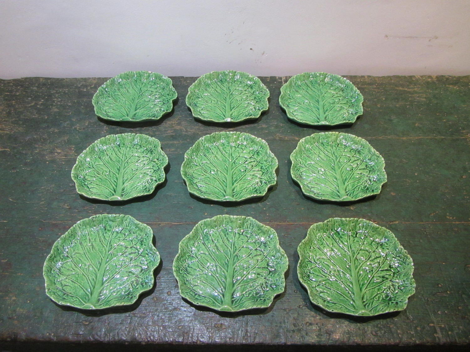 A set of 20 majolica cabbage leaf plates