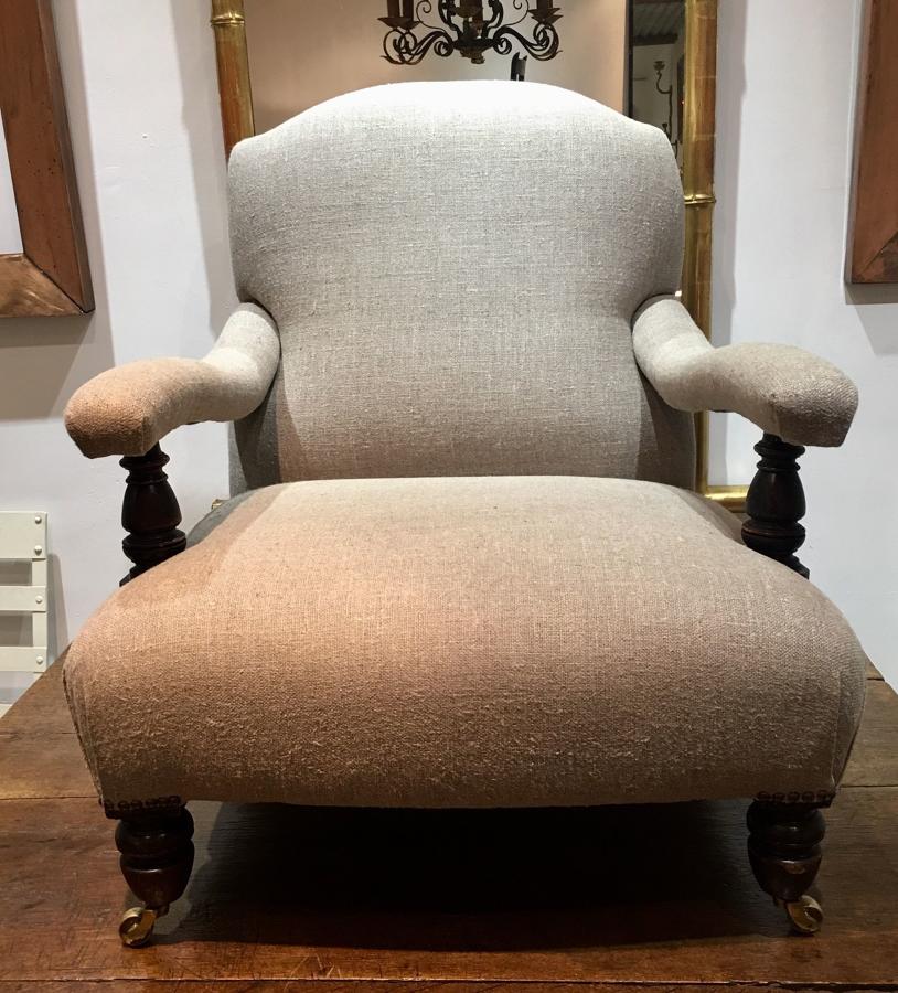 A country house open arm chair