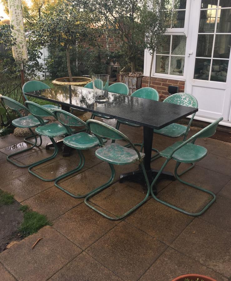 A set of 12 Aluminium cafe chairs