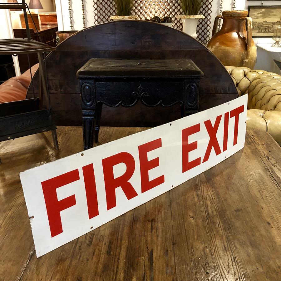 An Enamel fire exit sign