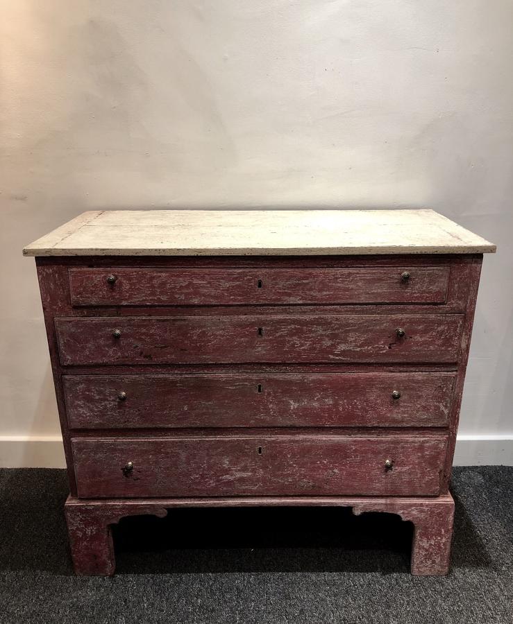 A petite painted commode