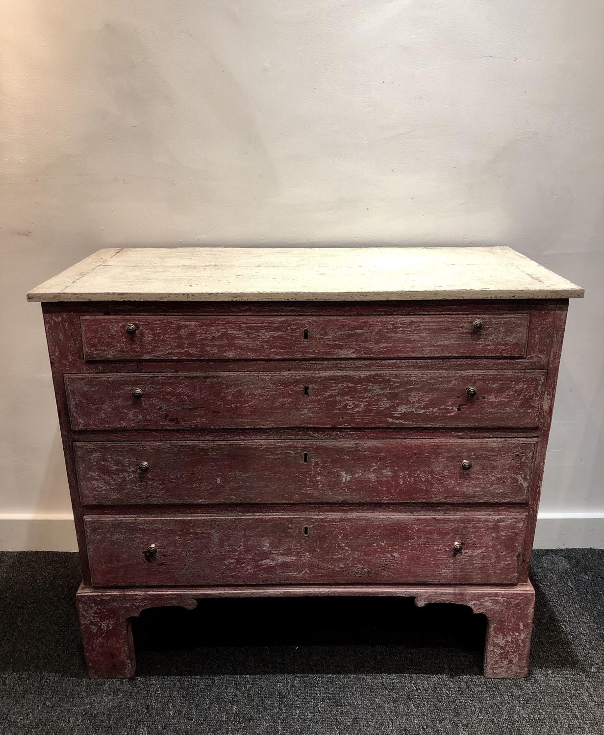 A petite painted commode