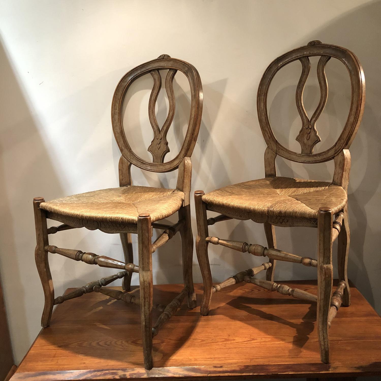 A pair of rush seat side chairs