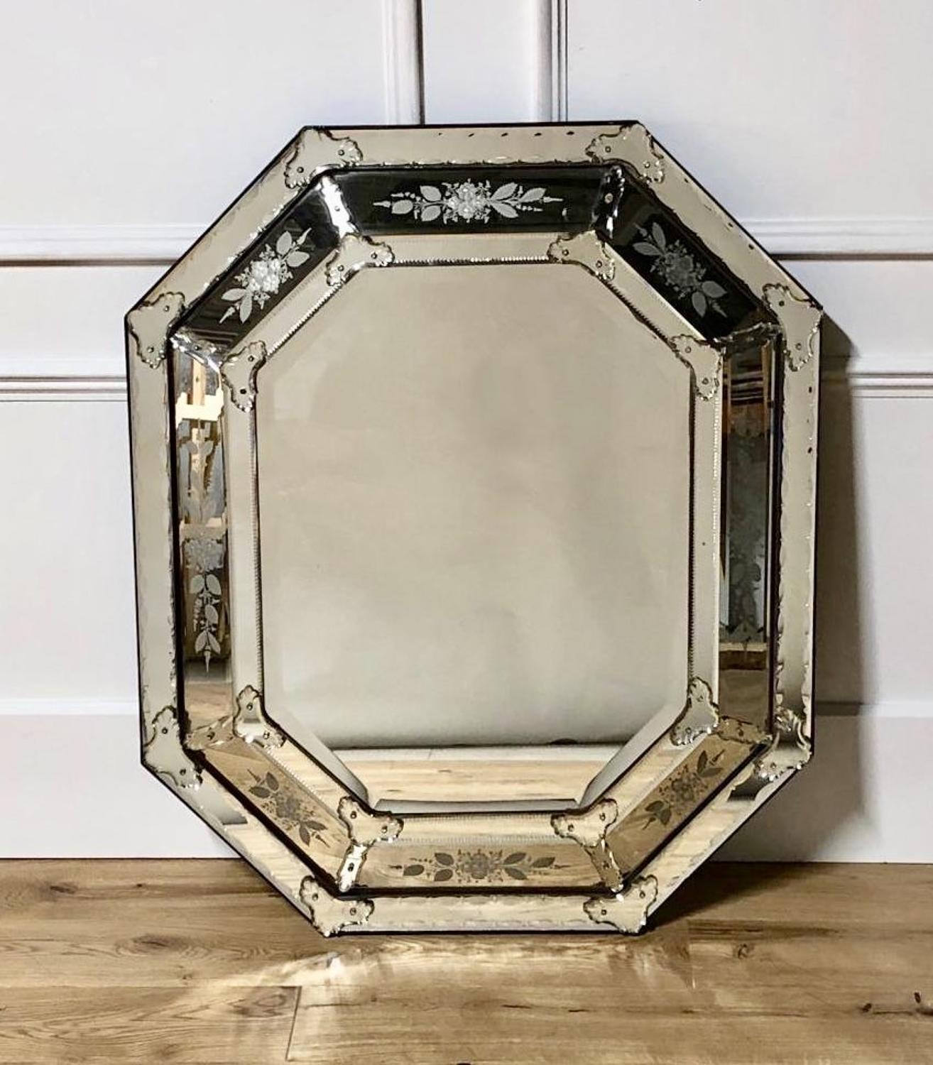 A large cushion Venetian Mirror