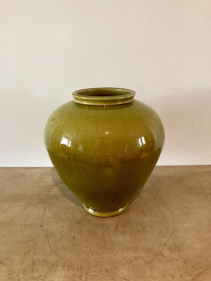 A glazed ceramic pot