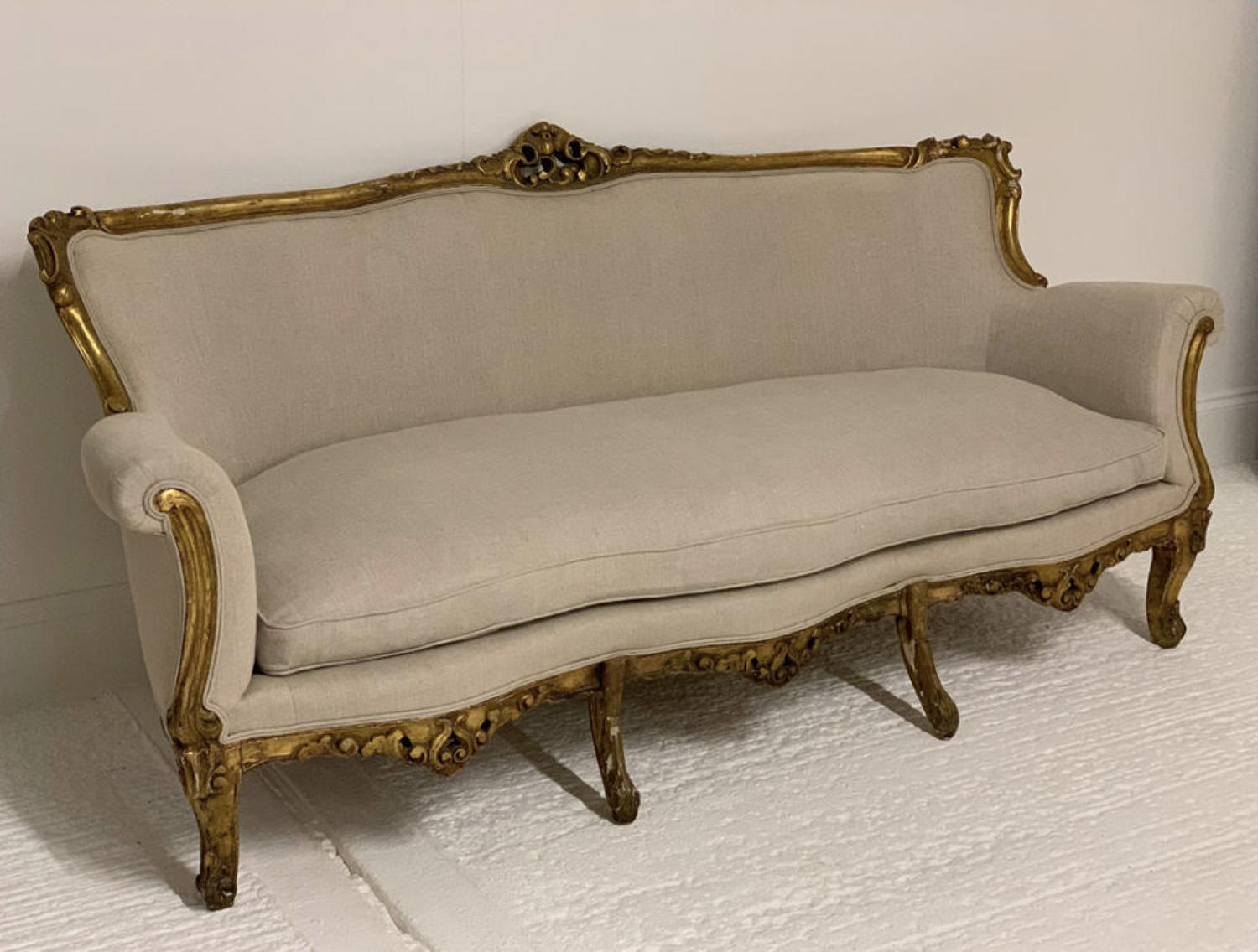 A carved Giltwood sofa