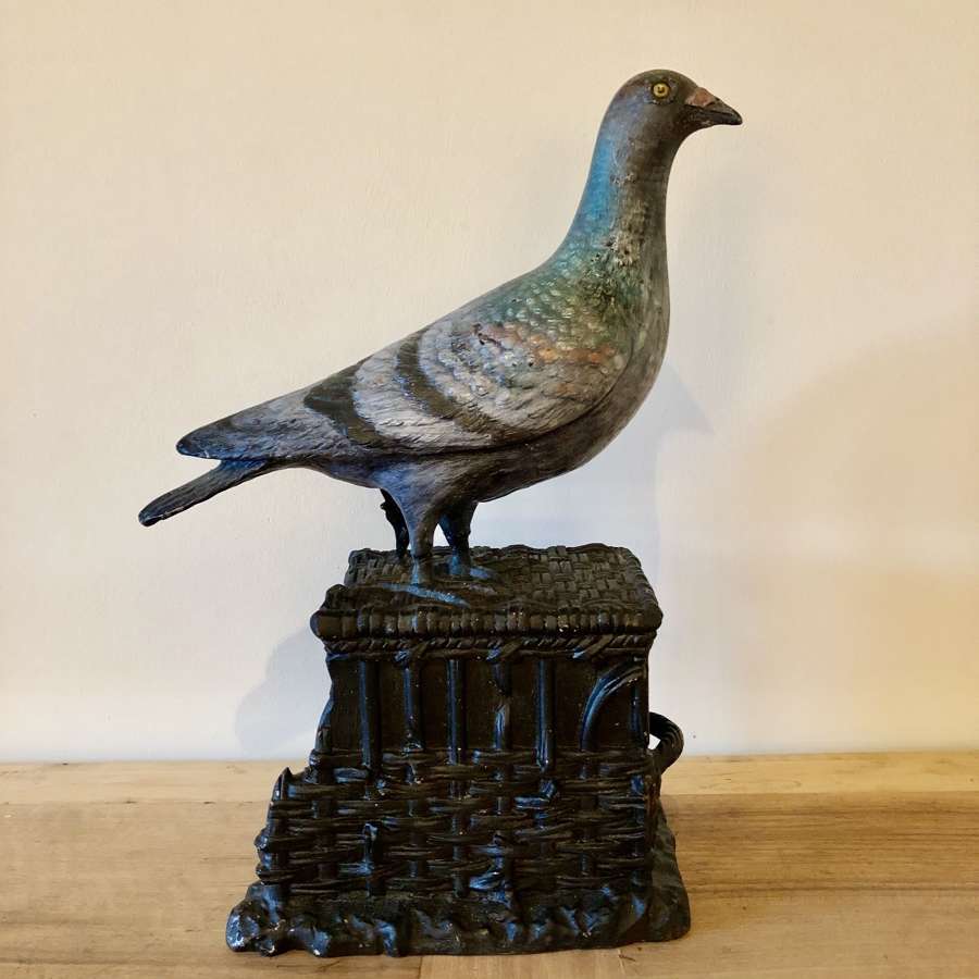 A Racing Pigeon figure on stand