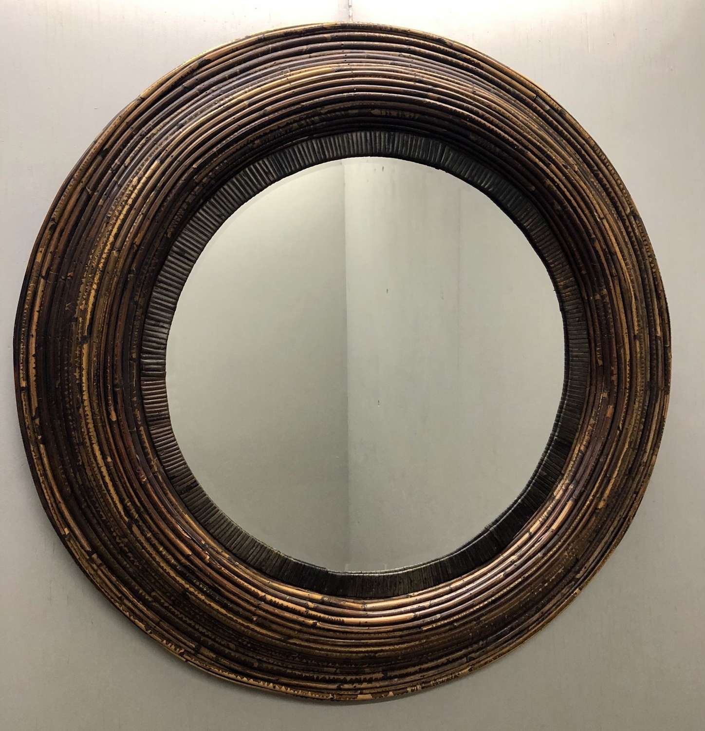 A bamboo cane circular mirror