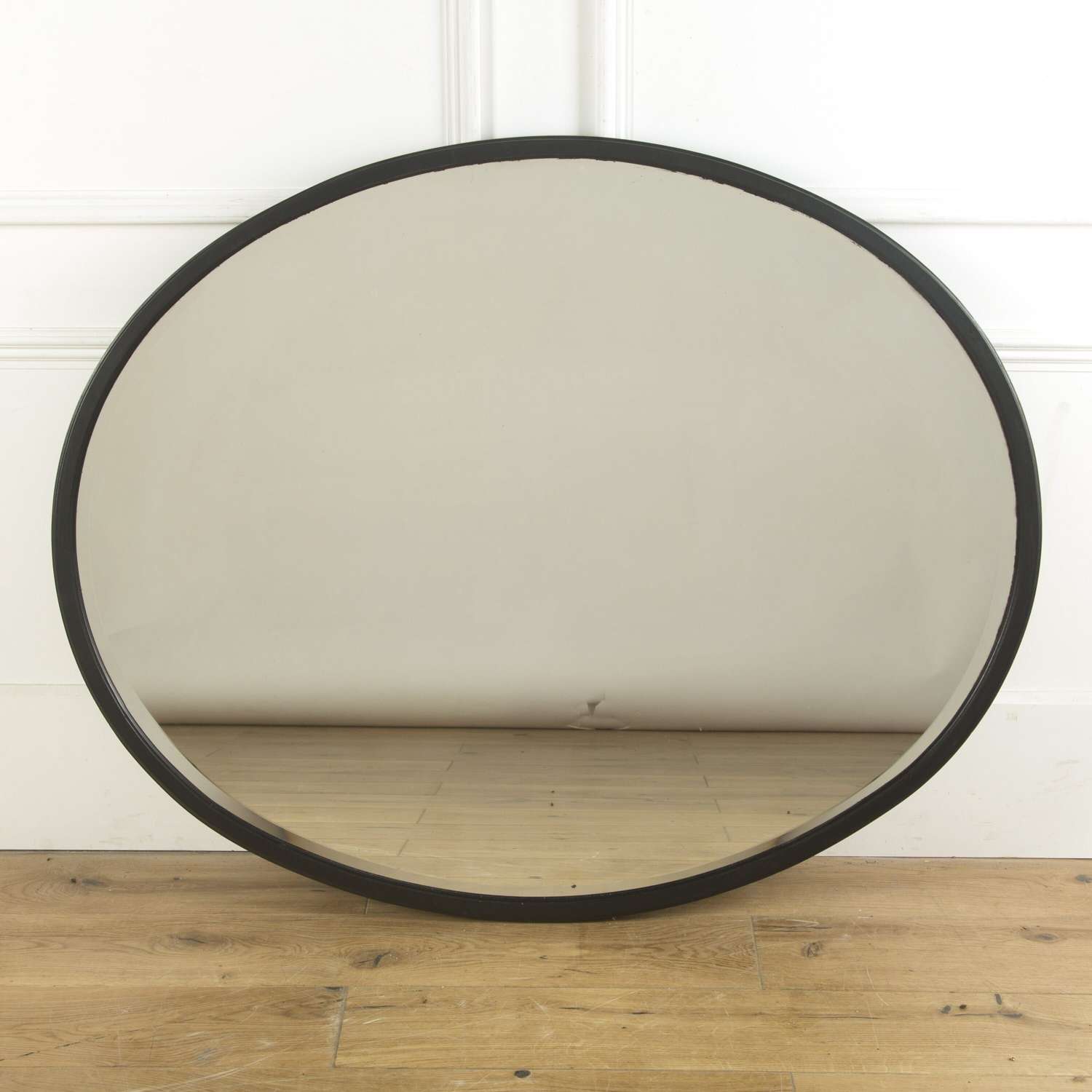 A large Edwardian Oval mirror