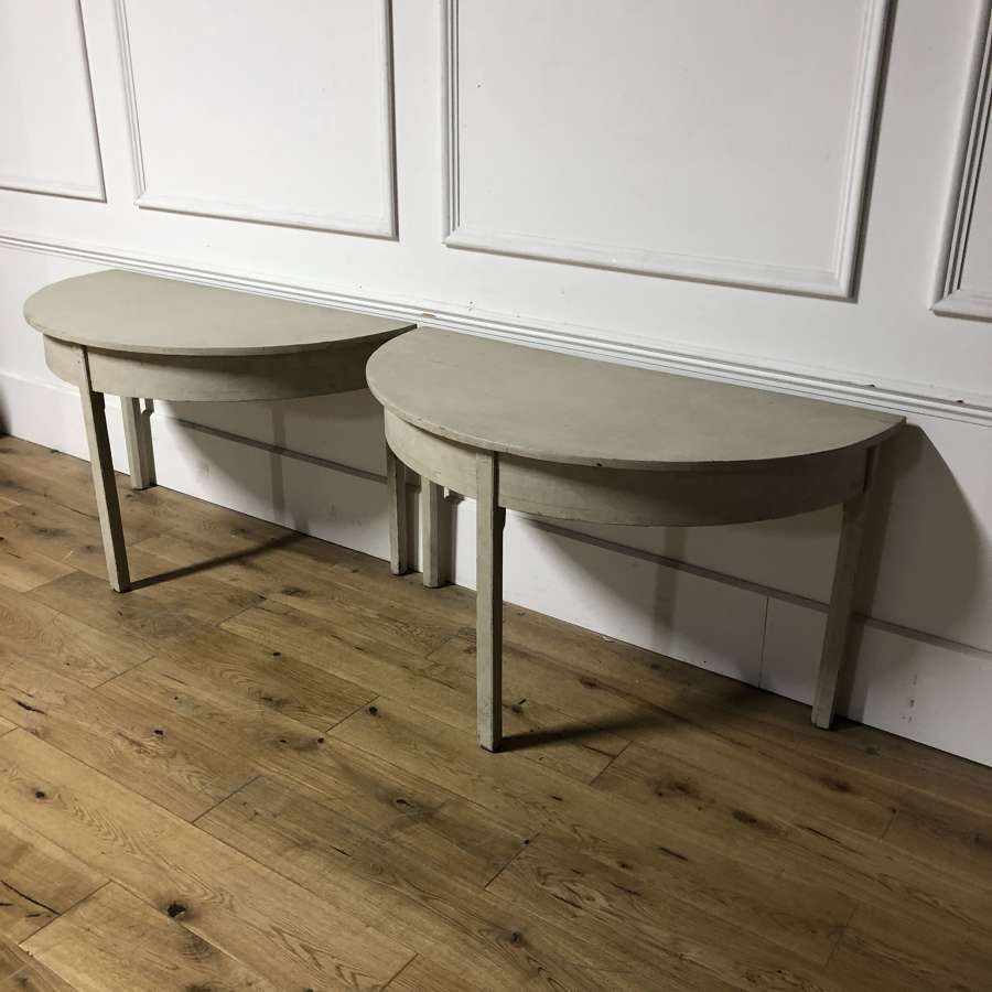 A Pair of Demi Lune Tables