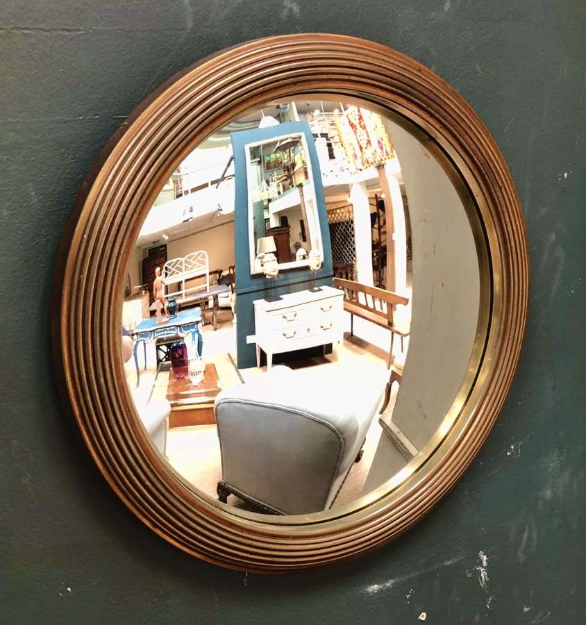 A brass bound convex mirror