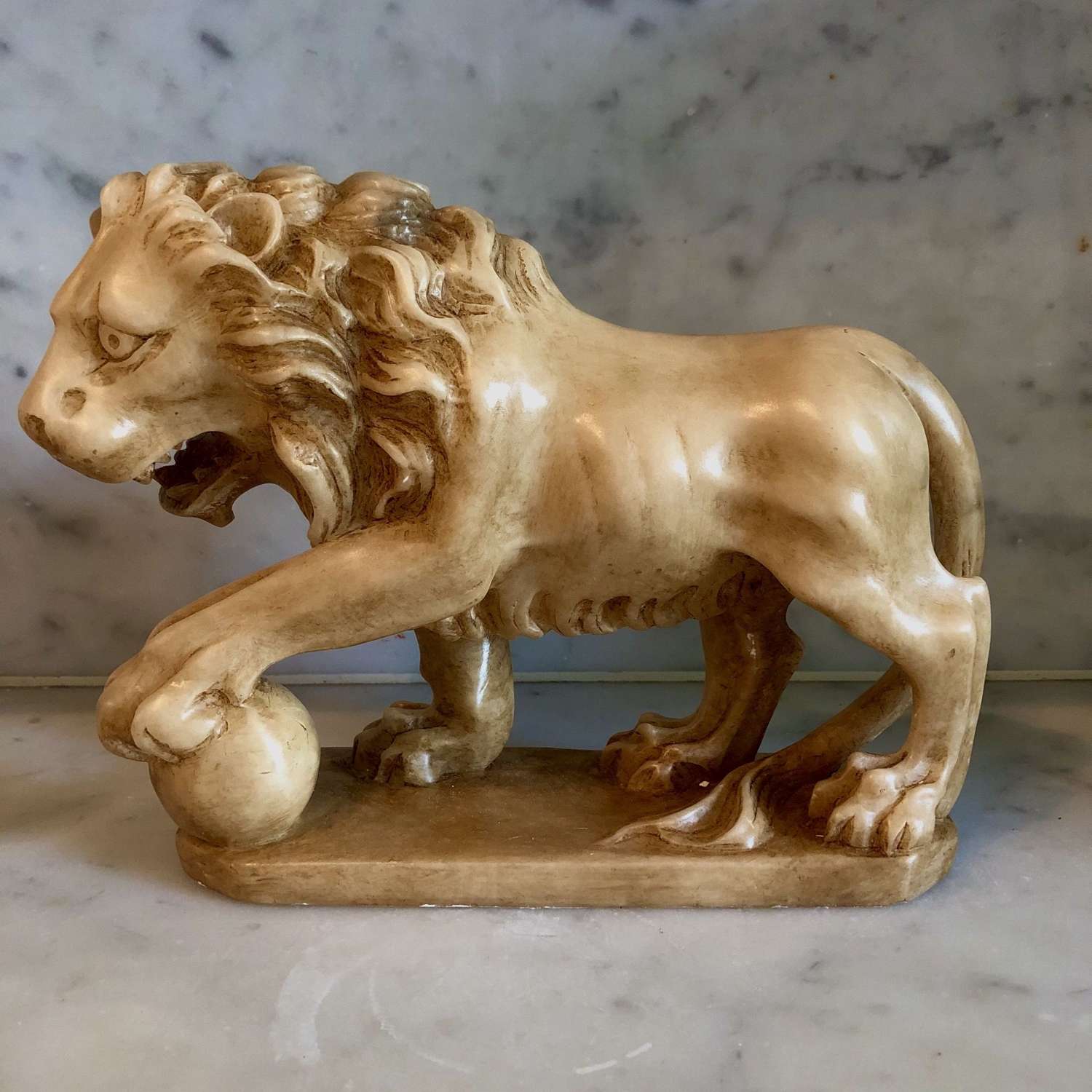 A carved alabaster lion