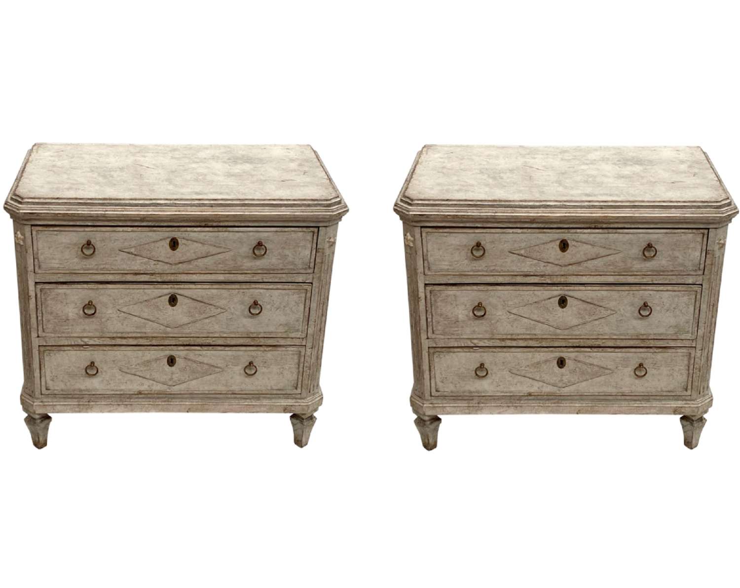 A pair of swedish painted commodes